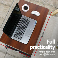 Castor wheels of portable laptop table desk showing 360-degree rotation and locking mechanism.