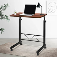 Compact dark wood portable laptop desk folded flat for easy storage and transport.