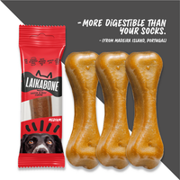 Medium size LAIKA BONE cheese and beef dog chew against a white background