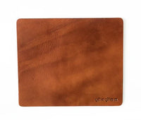 Light brown leather mouse pad displayed on white background showing smooth surface.