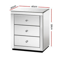 Close-up side view of the mirrored bedside table showing bevelled mirror glass surfaces.