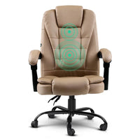 Close-up of cushioned headrest and backrest of the black massage office chair.