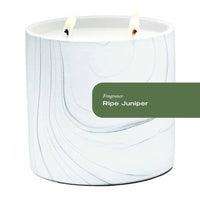 White marble ceramic candle vessel with gray and black swirls, 17oz Ripe Juniper scent.