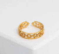 Top view of Hélodie Ring showing its polished gold surface and adjustable features