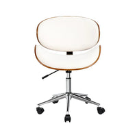 Close-up detail of the chair's wooden armrest and smooth PU leather seat surface.