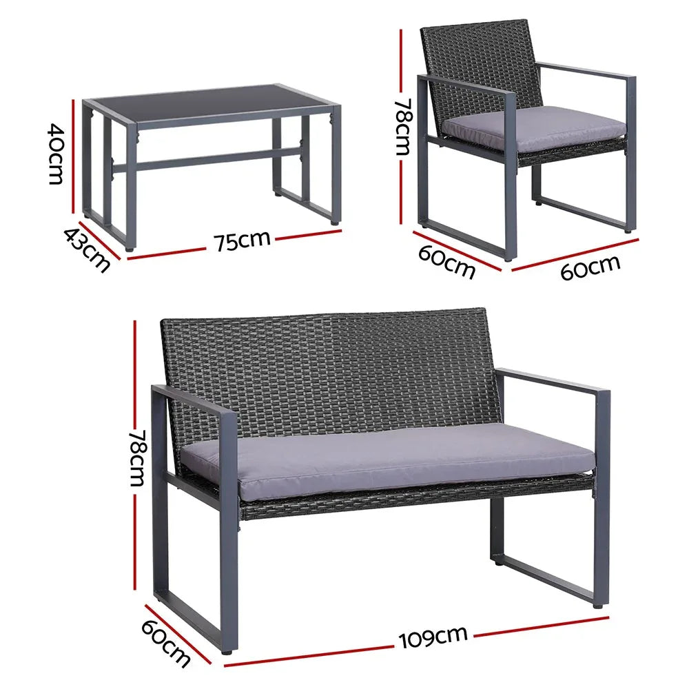 Close-up of black outdoor chair with thick cushion and woven PE wicker frame.