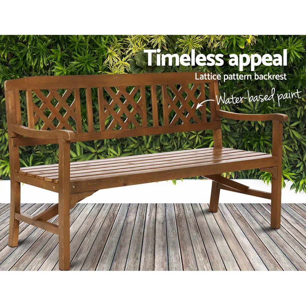 Three-seat rustic wooden bench on patio with visible knots and natural timber grain
