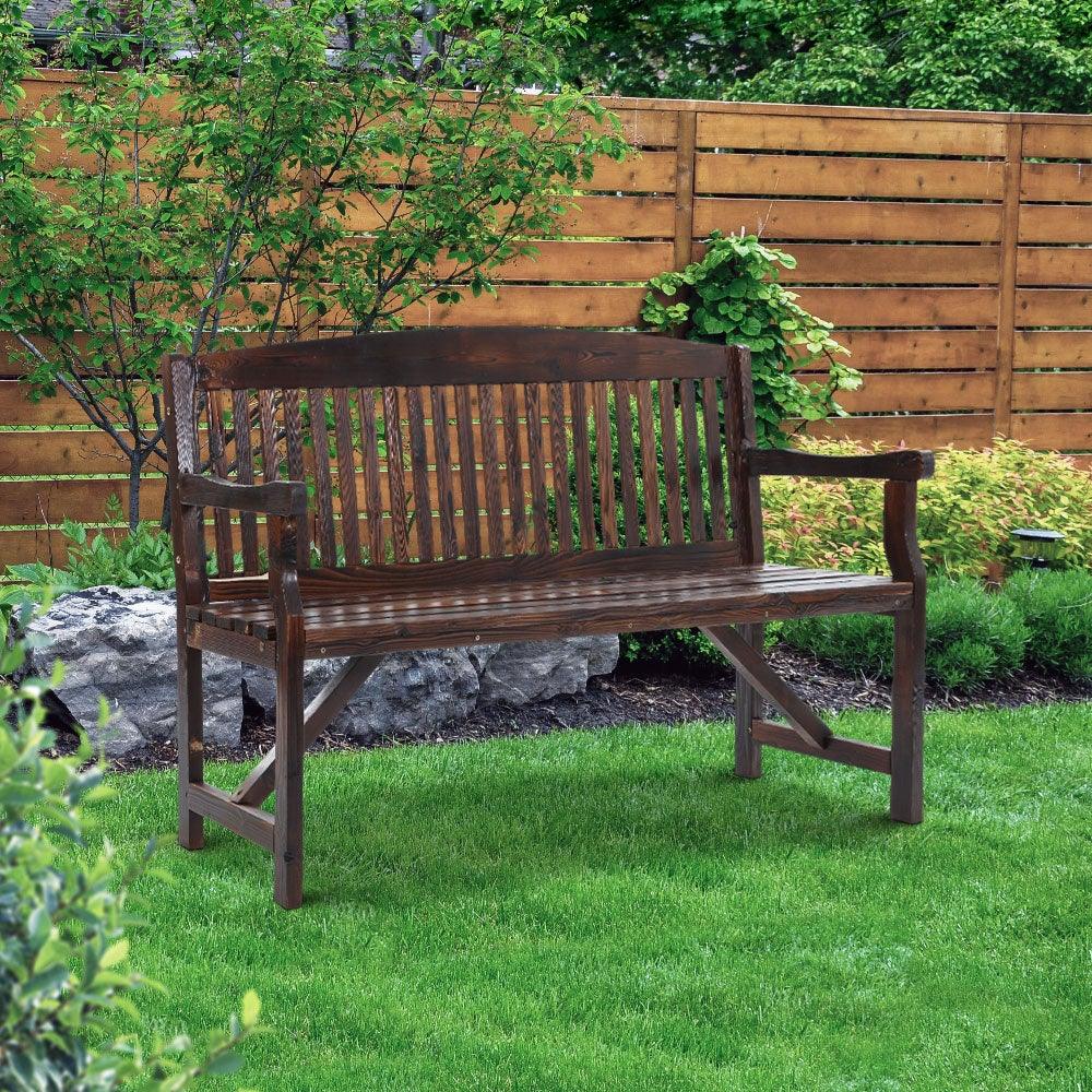 Detail of bench seat and armrest emphasizing smooth natural wood and craftsmanship