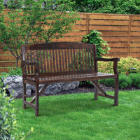 Detail of bench seat and armrest emphasizing smooth natural wood and craftsmanship
