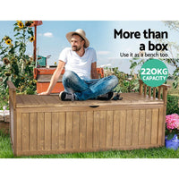 Wooden storage bench placed against stone wall for patio outdoor seating
