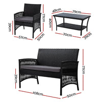 Close-up of woven black wicker texture and cushions of outdoor furniture set.