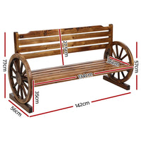 Close-up view of wooden wagon wheel armrest detail on outdoor garden bench
