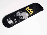 Posty Skateboard standing upright with detailed graphics visible on the deck.
