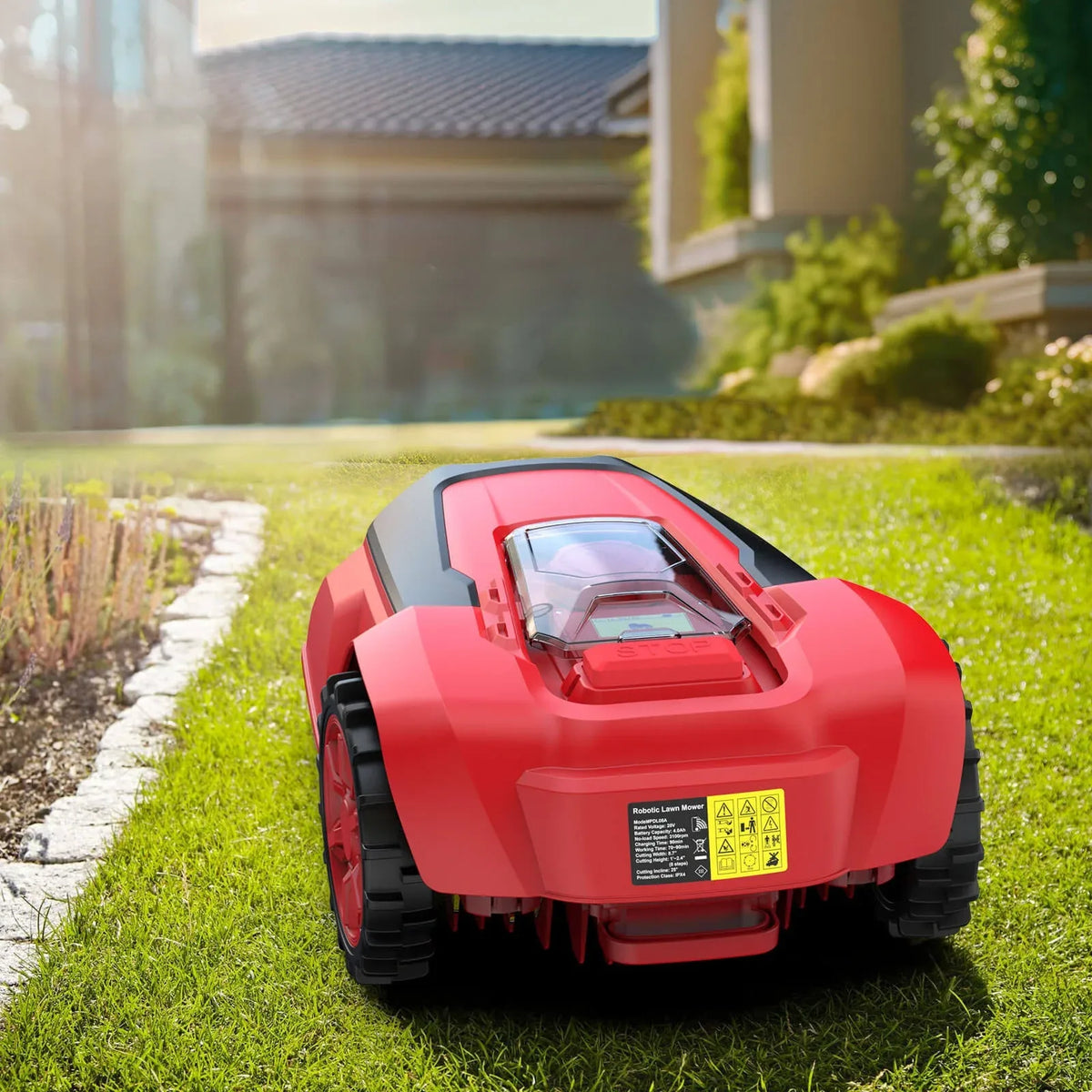 Close-up of mower's control panel and wheels on a green lawn