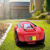 Close-up of mower's control panel and wheels on a green lawn
