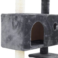 View of sisal-covered posts and soft platforms on a tall cat scratching post tower.