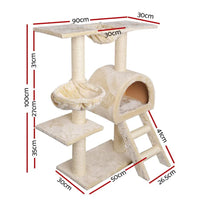Cat tree with several platforms and hanging toys, offering spaces for climbing and scratching.