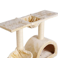 Side perspective of the cat tree highlighting padded platforms and hanging rope toy.