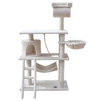 Close-up of plush beige cat tree with sisal-covered scratching post and resting area.