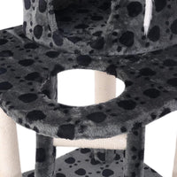Close-up on thick sisal-wrapped post of beige cat tree for cats to scratch and climb on.