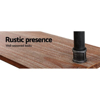 Rustic 6-level pipe shelf assembled in an indoor setting highlighting its industrial design.