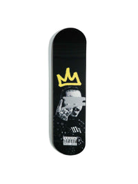 Close-up of Posty Skateboard deck with colorful graffiti design.