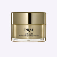 Jar of PRAI Beauty 24K Gold Wrinkle Repair Night Creme with whipped texture and gold accents on label