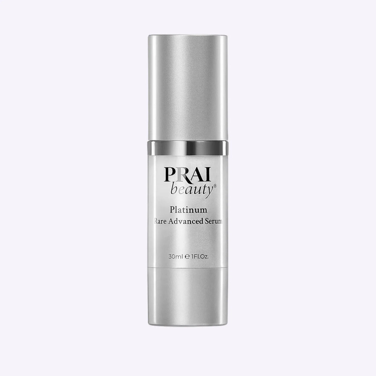 Bottle of PRAI Beauty Platinum Rare Advanced Serum in 30ml size with silver and white design.