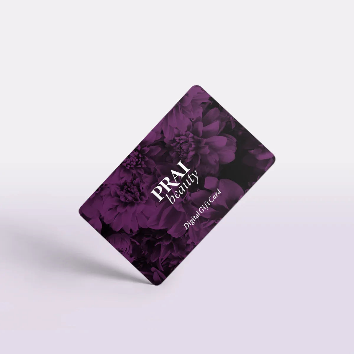 Digital PRAI Beauty Gift Card with elegant design featuring gift bow and brand text