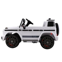 Rear view of white Mercedes-Benz AMG G63 kids electric car showing tail lights and bumper
