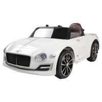 Front angle view of white Bentley Kids Ride On Car with realistic details and headlights on display.