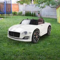 Close-up shot of the ride on car’s side mirrors and door handle in pristine white finish.