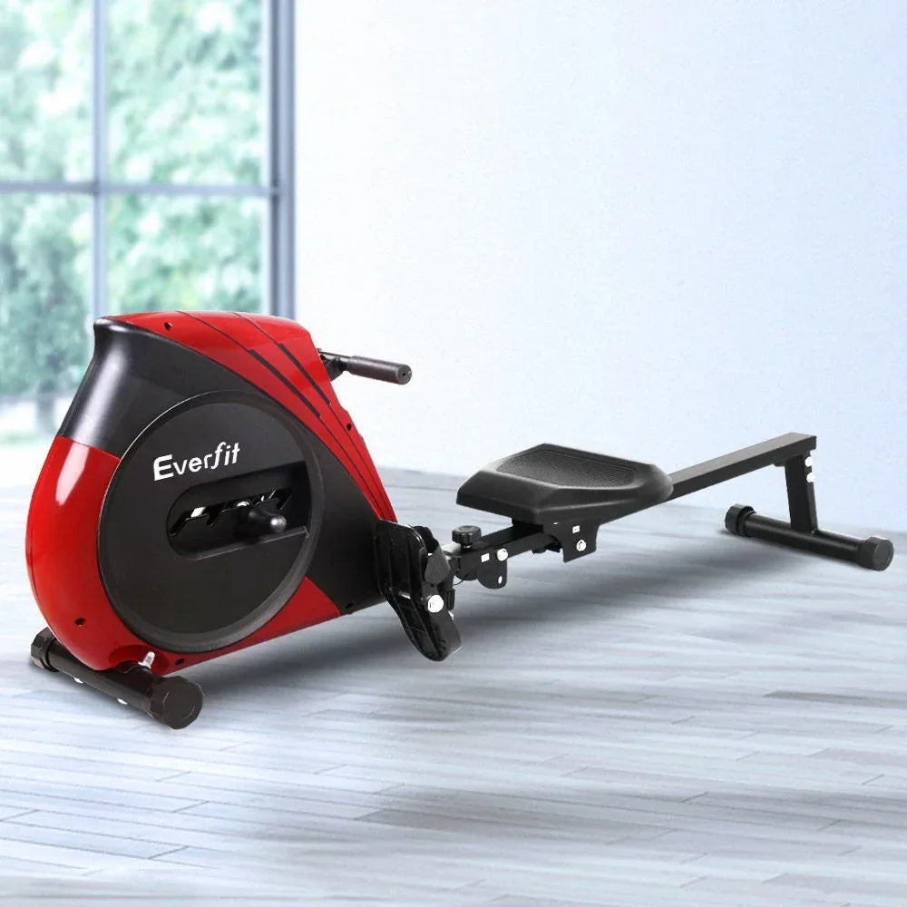 Close-up of the rowing machine's anti-slip footrests and adjustable foot straps.