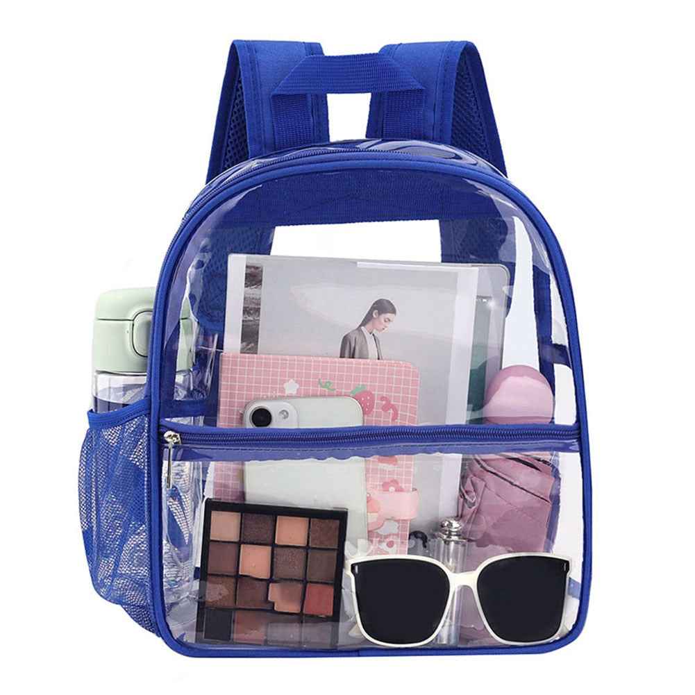 Clear mini backpack worn on shoulder, showing adjustable straps and compact size.