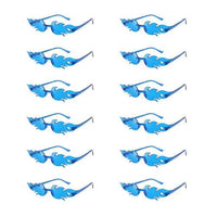 Twelve colorful flame-shaped sunglasses with gradient lenses arranged on a white background.