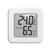 Indoor mini temperature and humidity meter displaying numbers clearly on a backlit screen.
