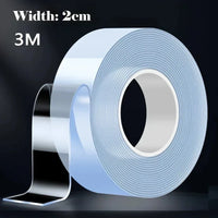 A roll of transparent, double-sided adhesive tape placed on a white background.