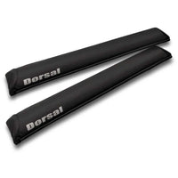 Two DORSAL Aero roof rack pads laid flat showing yellow and black surface texture.