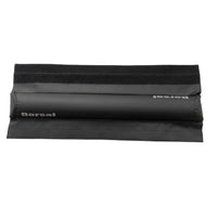 DORSAL SunGuard roof rack pad mounted on a car's wide aero crossbar outdoors.