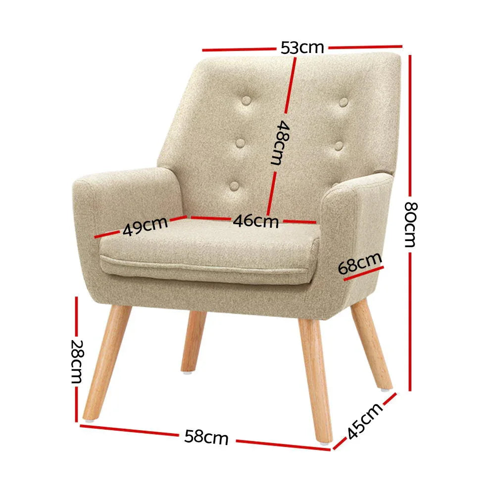 Side profile of beige fabric armchair showing padded armrests and sturdy wooden legs.