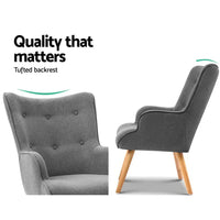 Close-up of grey fabric and button tufting on Artiss Armchair armrest
