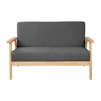 Side view of grey 2-seater fabric sofa highlighting its wooden legs with floor protectors.