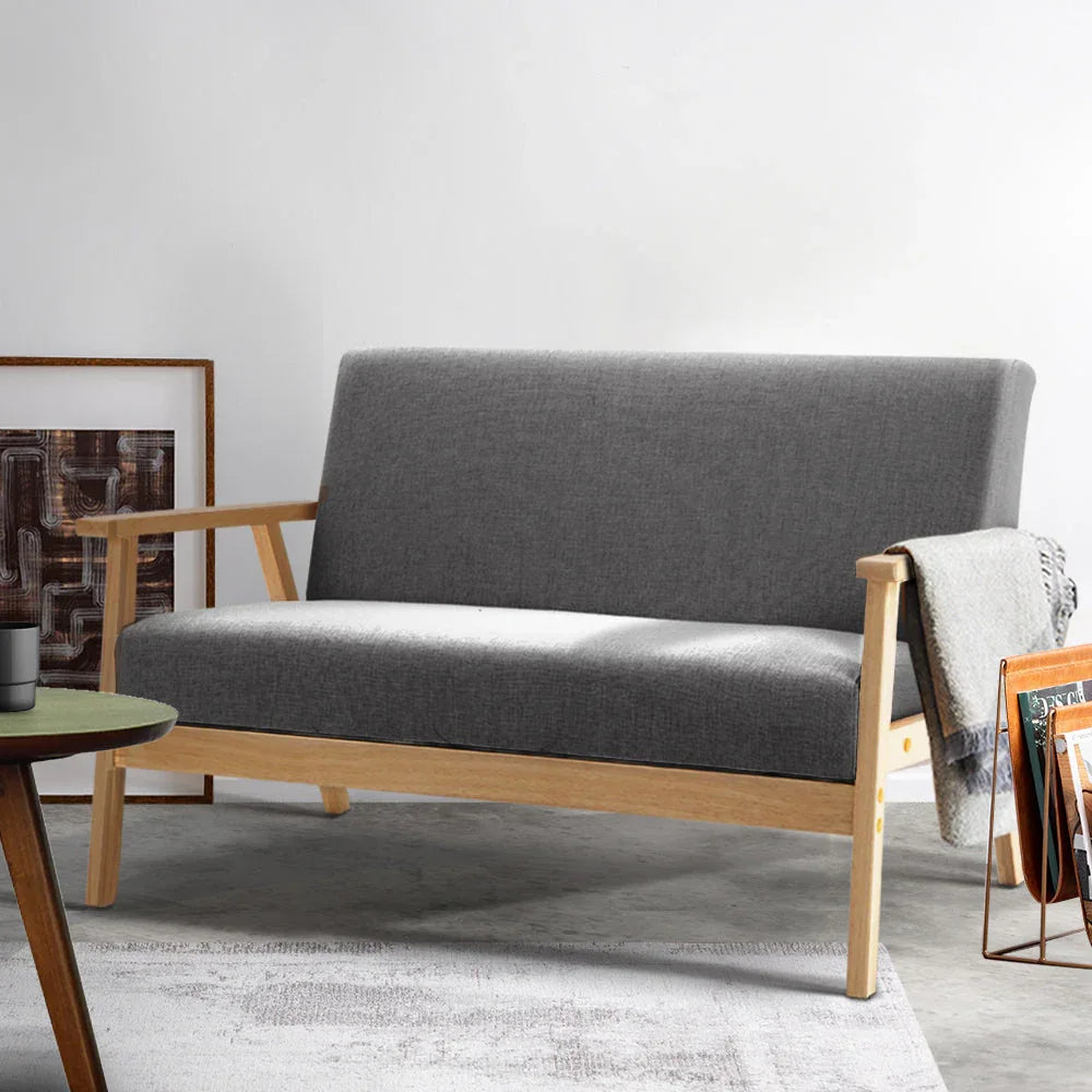 Grey 2-seater fabric sofa with cushioned backrest and seat shown from a top angle.