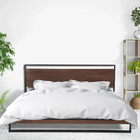Detailed look at steel platform and floor protectors on black Milano Azure bed frame.
