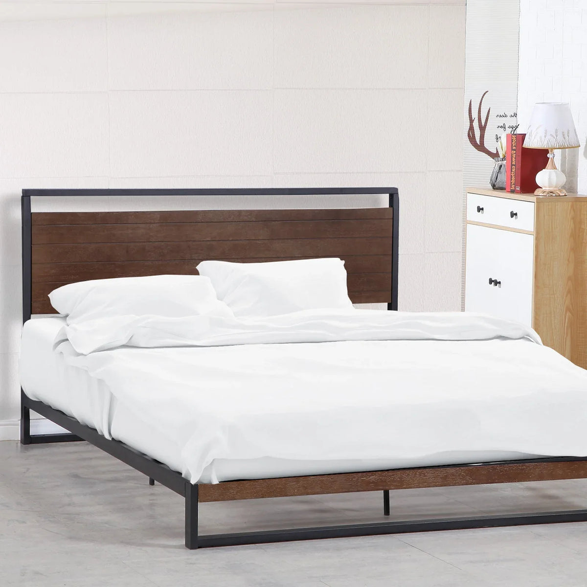 Modern minimalist bedroom featuring Milano Decor Azure black wood and steel bed frame.
