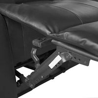 Side view of black faux leather recliner sofa highlighting thick cushioning and armrest.