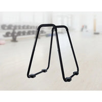 Side view of sturdy parallette stand with parallel bars and fitness suspension straps.