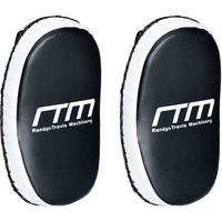Close-up of dense three-layer foam padding inside curved strike shield