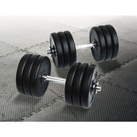 Close-up of adjustable dumbbell showing metal handle and black weight plates stacked.