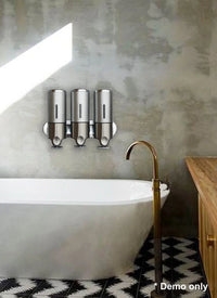 Shower dispenser installed in a bathroom showing sleek design and easy-to-pump liquid soap containers.